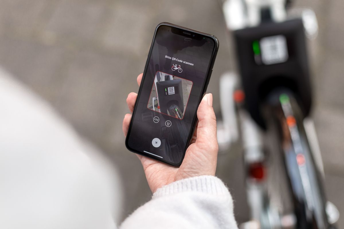Scan the QR code on the bike via smartphone