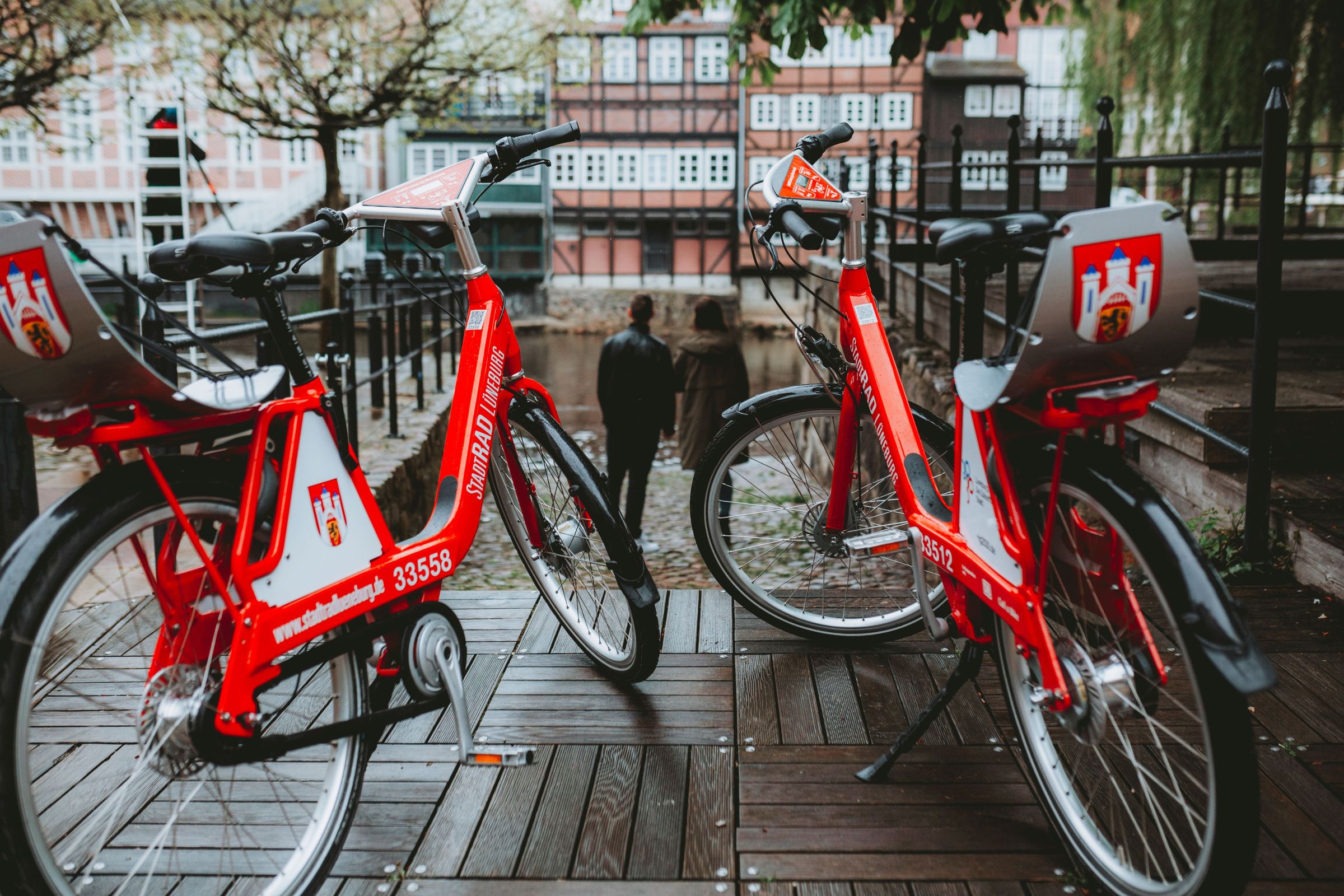 Two city bikes Lüneburg park in pedestrian zone