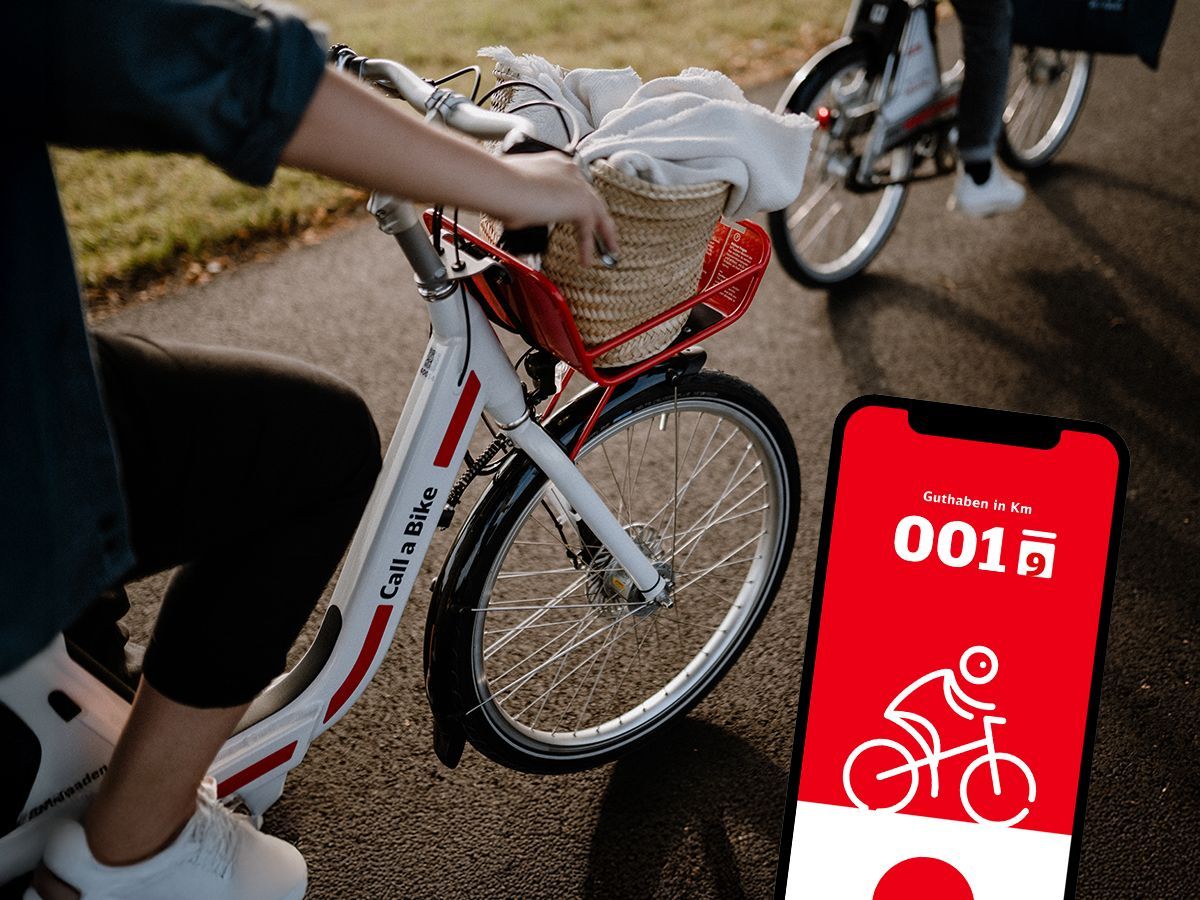 Two people are riding Call a Bike bicycles along a street. On the right, a smartphone screen displays the Rad+ App.