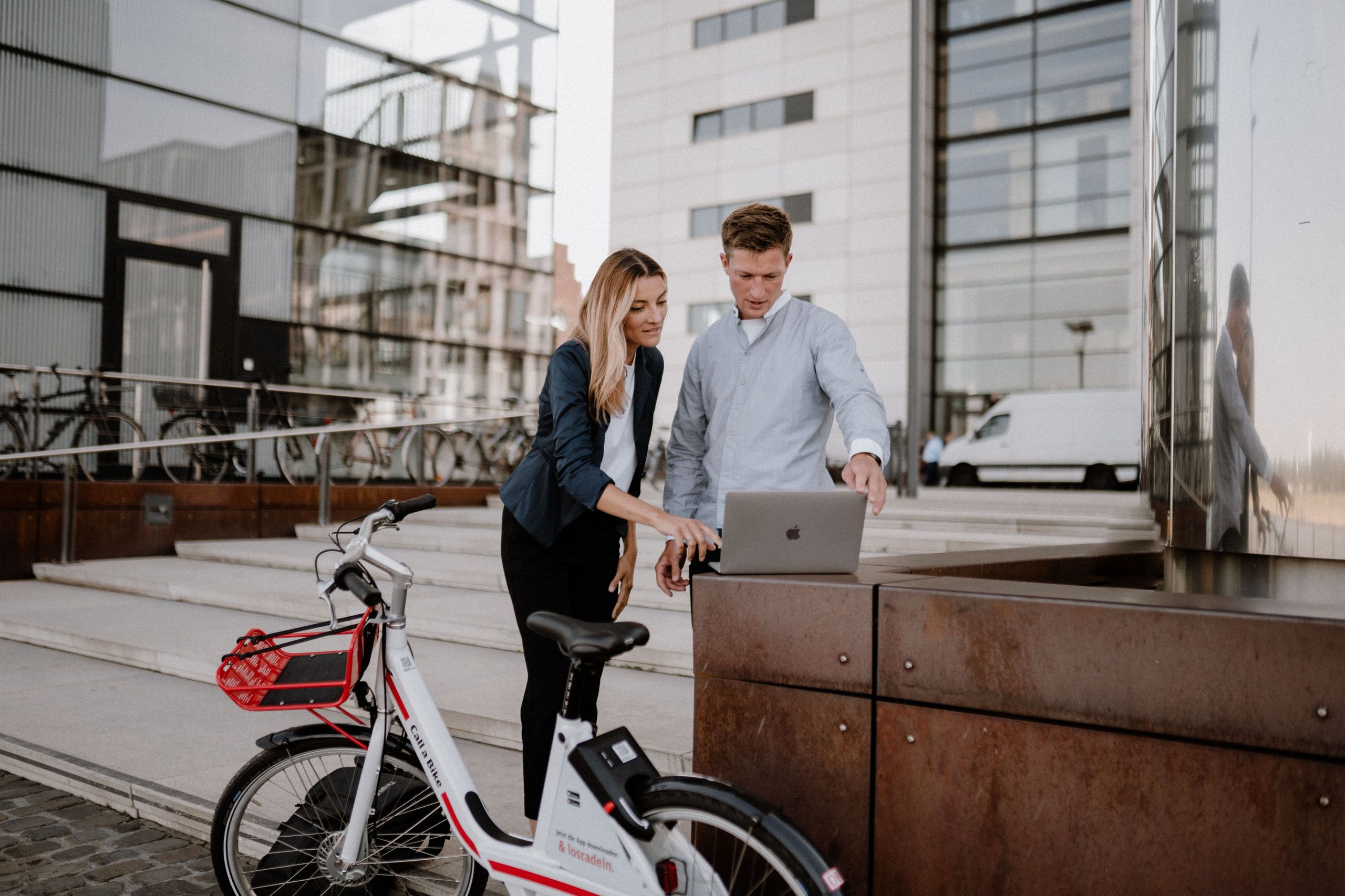 Man and woman in front of laptop